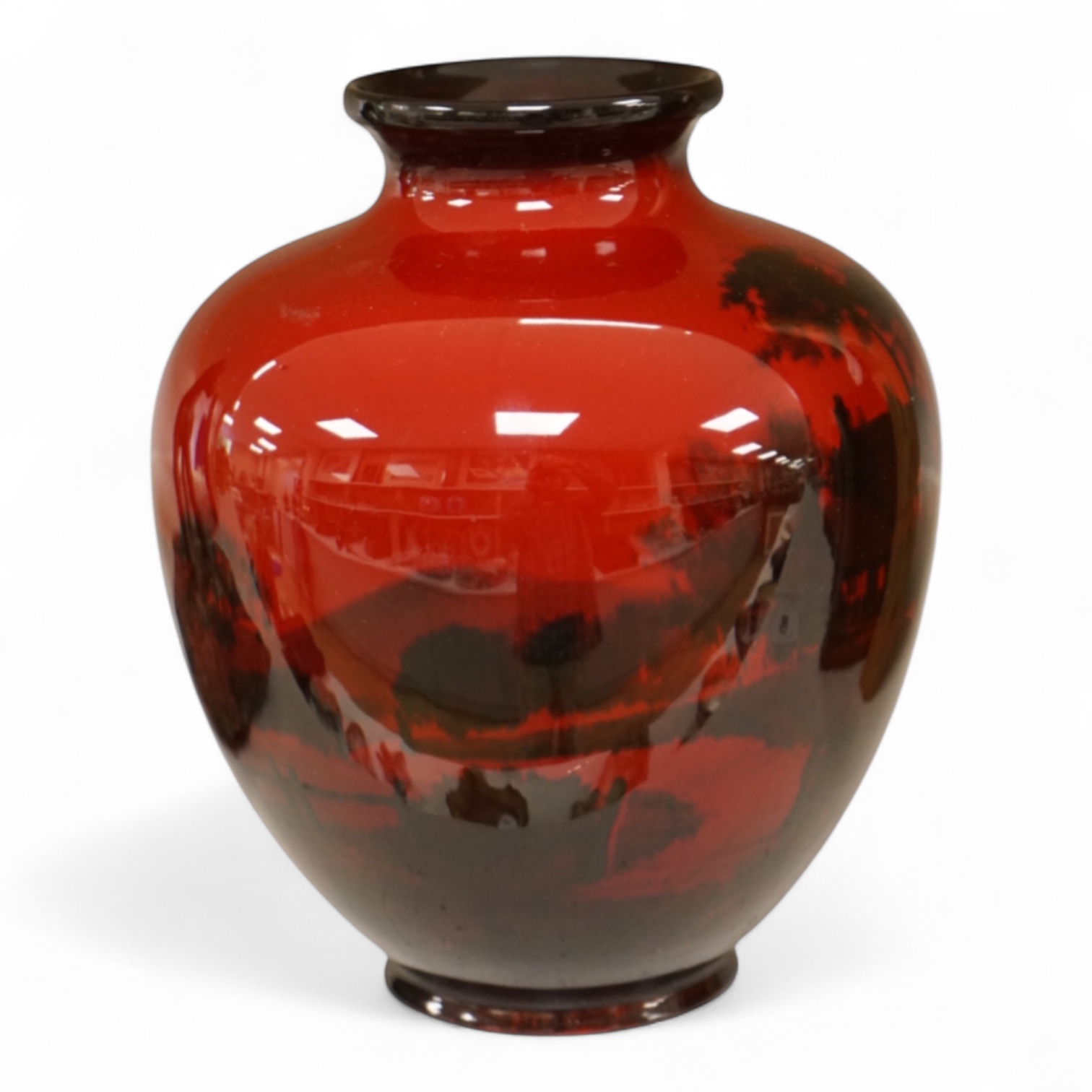 A Royal Doulton flambé vase decorated with a landscape, 19cm high